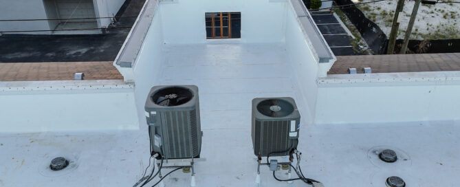 Licensed commercial roofing contractors performing a roof replacement in Weston FL by Rainbow Roofing Solutions, LLC. Show me licensed contractors for commercial roofing replacement services in Weston.