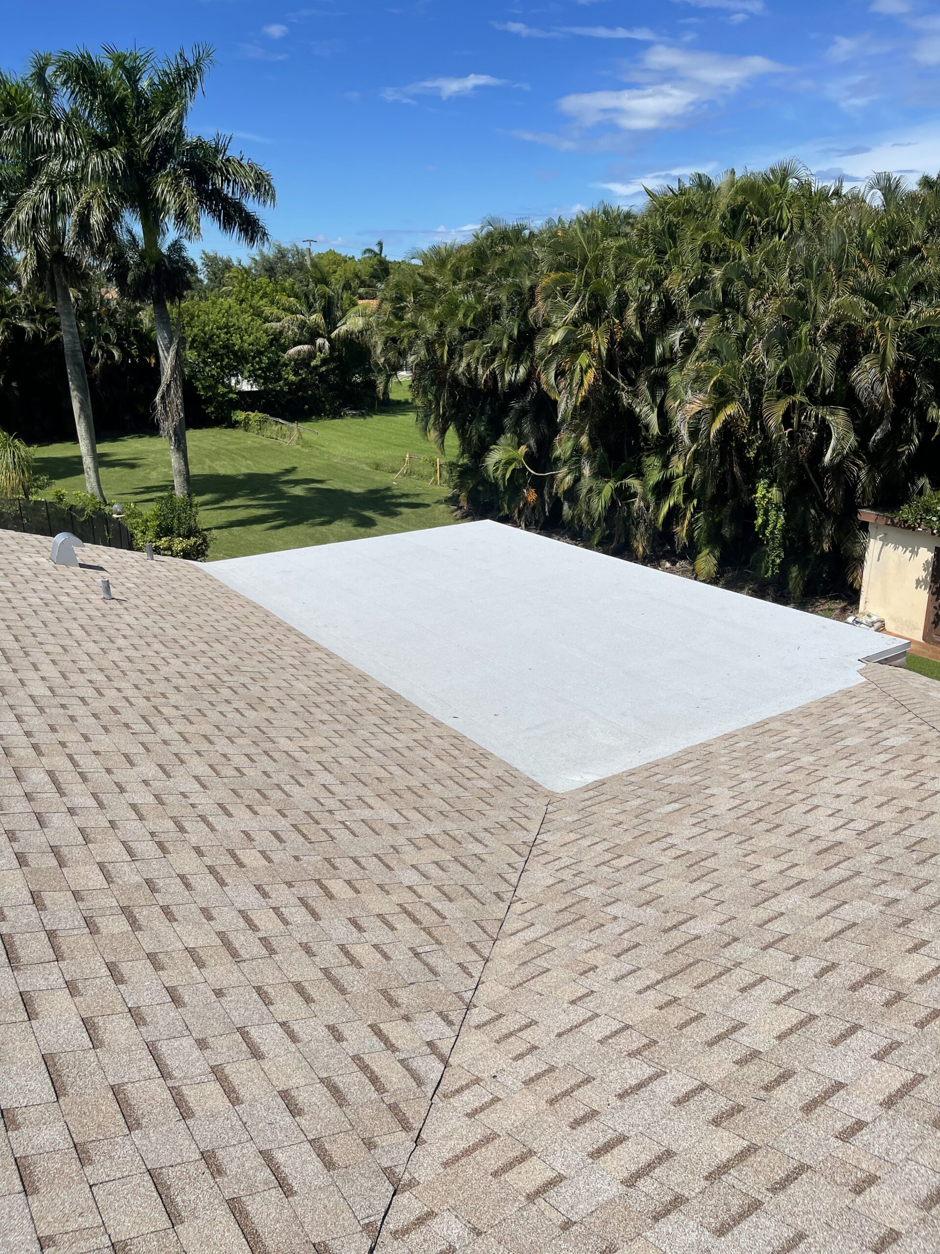 Residential roof repair inspection in Coral Springs, Florida by Rainbow Roofing Solutions, LLC