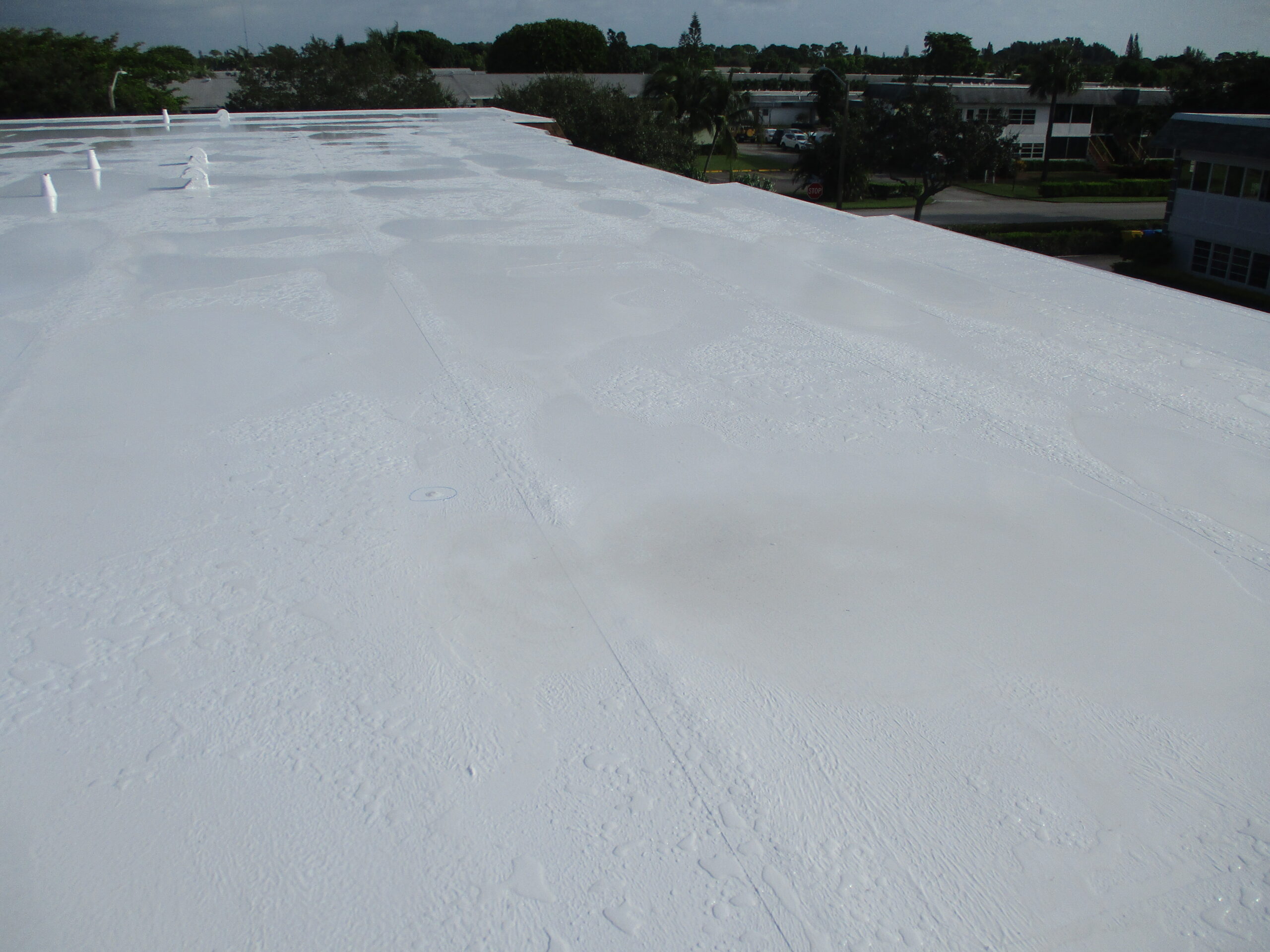 Rainbow Roofing Solutions, LLC explaining why choosing cheap roofing in Florida may cost more over time due to leaks, poor workmanship, storm damage, short roof life, and expensive repairs.