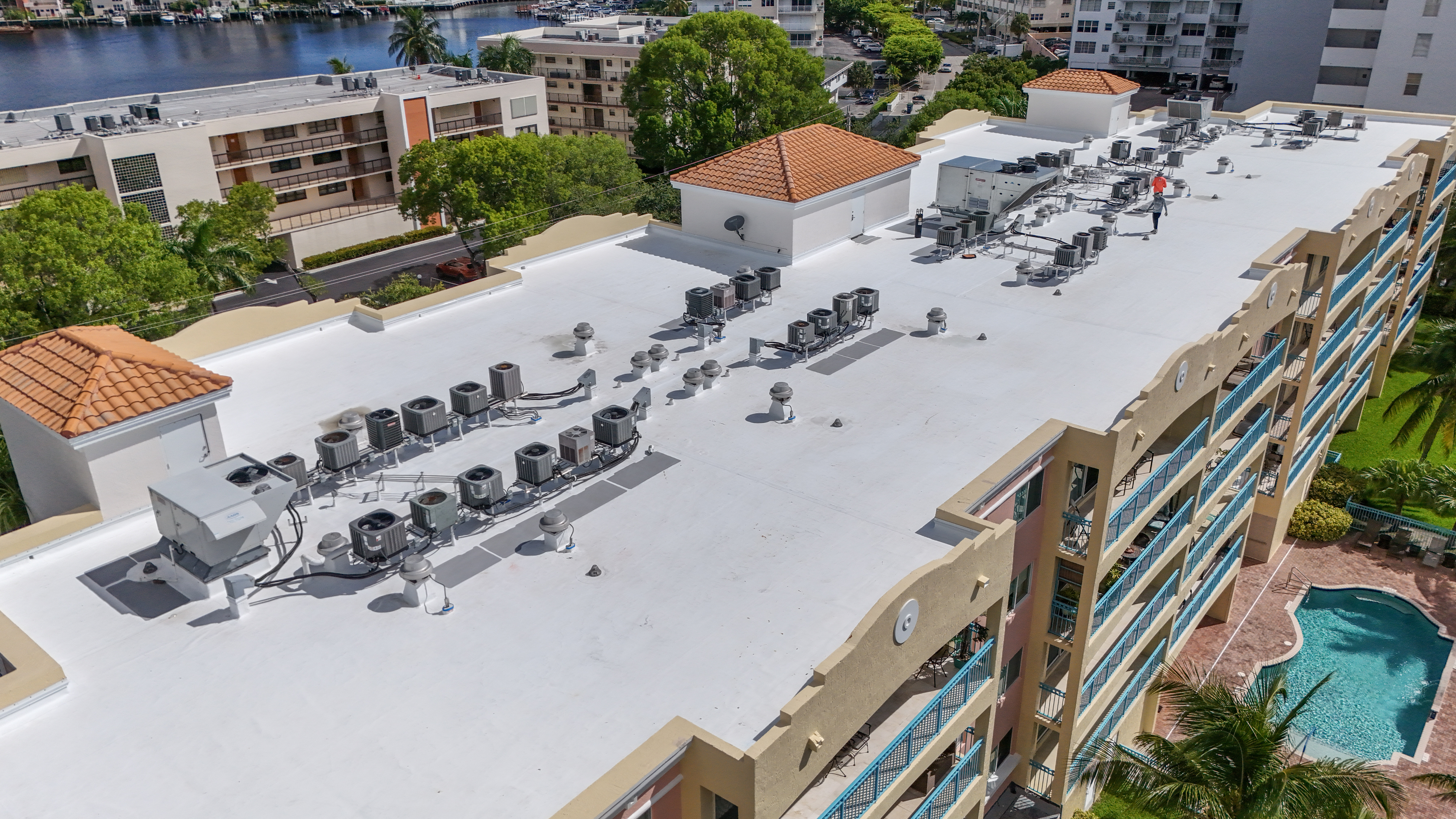 Emergency commercial roof leak help in Boca Raton, Florida with documentation steps and contact information for Rainbow Roofing Solutions, LLC