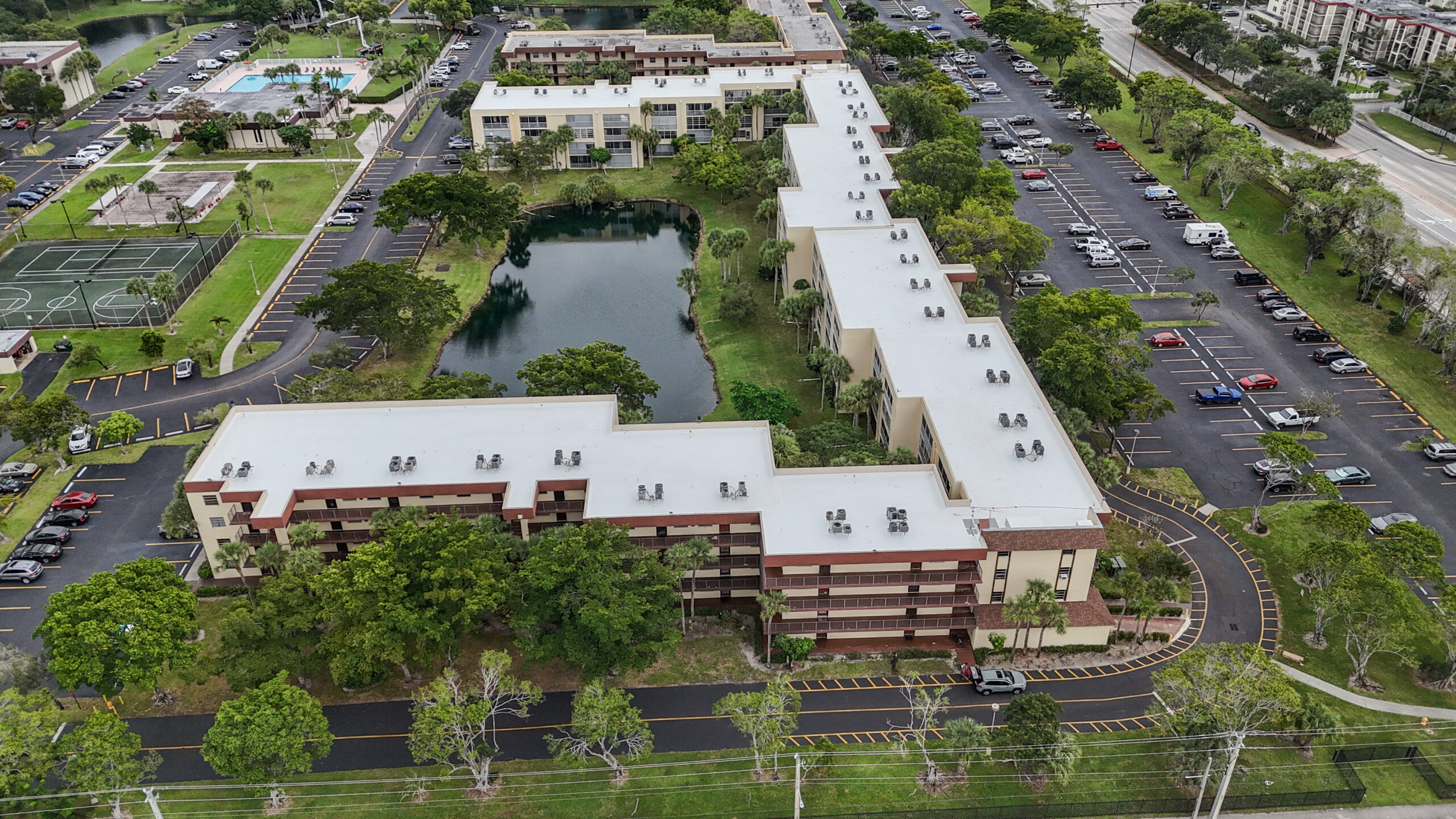 Rainbow Roofing Solutions, LLC explaining when thermoplastic roof restoration may be a better choice than a new roof for Florida commercial, condo, flat, TPO, and PVC roofing systems.