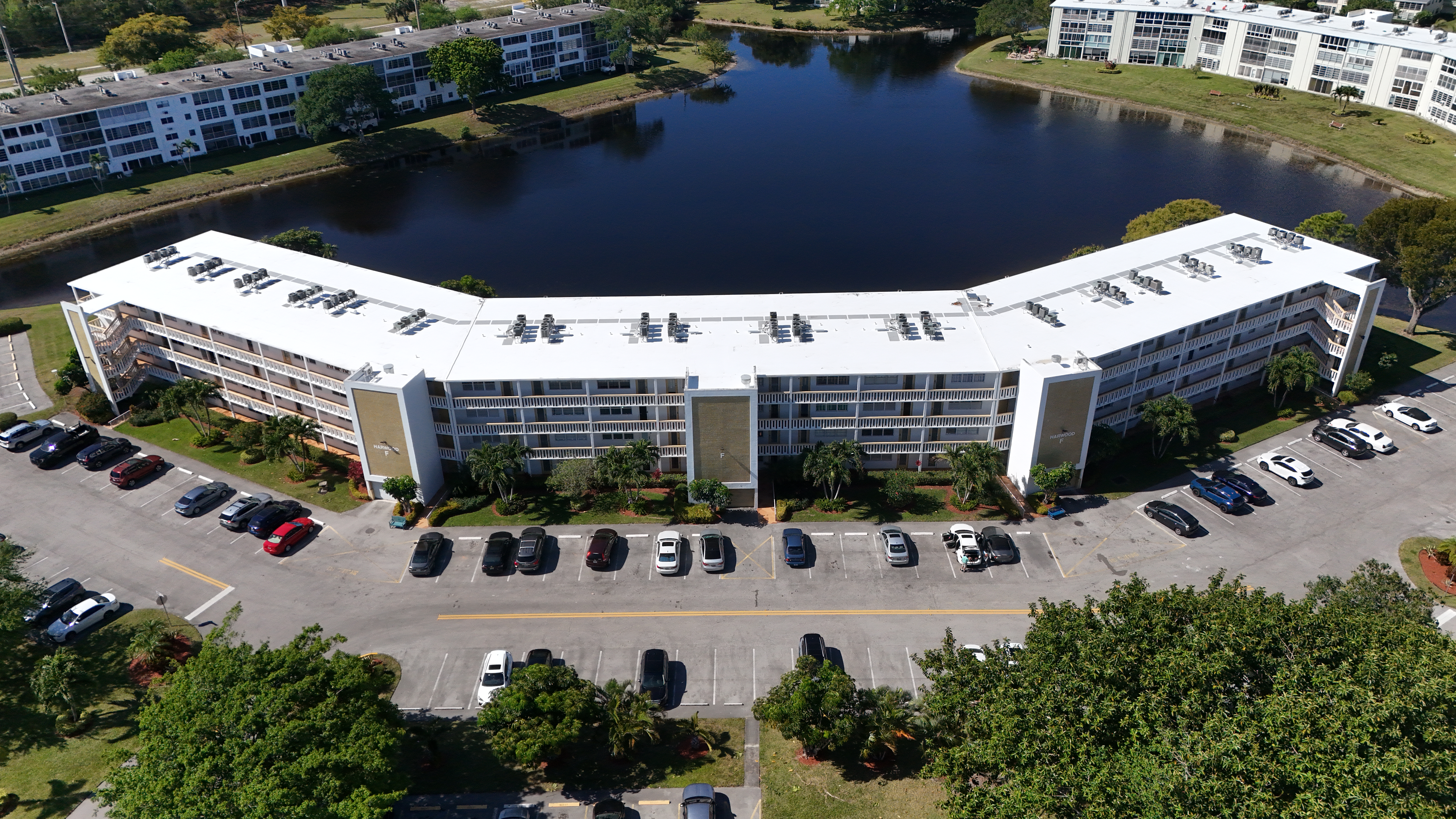 What to Look For When Re-Roofing Your South Florida Condo Rainbow Roofing Solutions, LLC helping South Florida condo associations, CAMs, board members, and property managers with condo re-roofing, roof inspections, drainage issues, flat roof replacement, storm damage support, and long-term roofing planning.