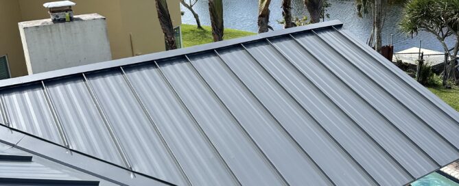 Residential roofing repair contractor inspecting a home roof near Coral Springs, Florida