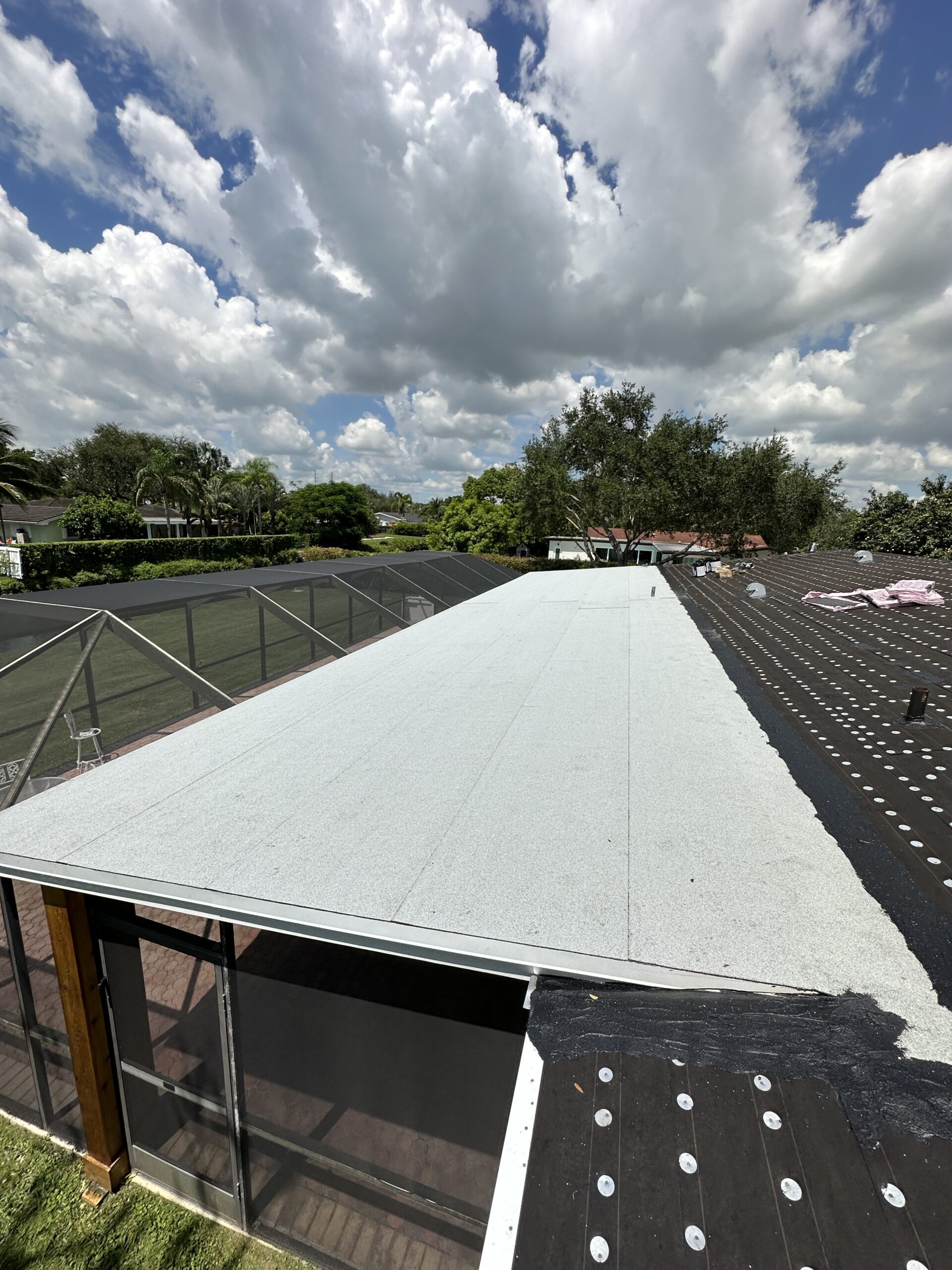 Commercial flat roof repair service in Palm Beach County, Florida for low-slope buildings and roof leak response