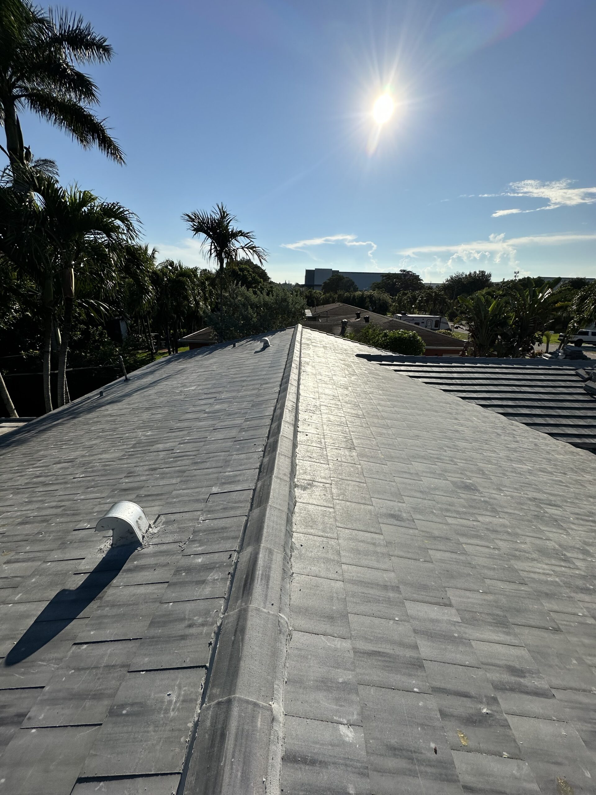 Residential roof in Plantation, Florida repaired by local roofing contractor Rainbow Roofing Solutions, LLC