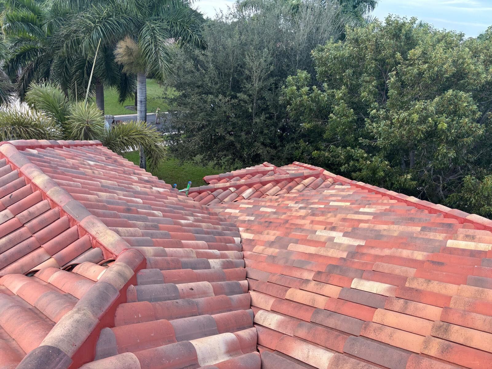 Rainbow Roofing Solutions crew performing commercial roof repairs on a flat roof in Hollywood, Florida,